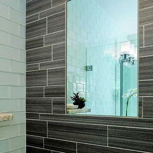 Flush-mount, fog-free shower mirror.