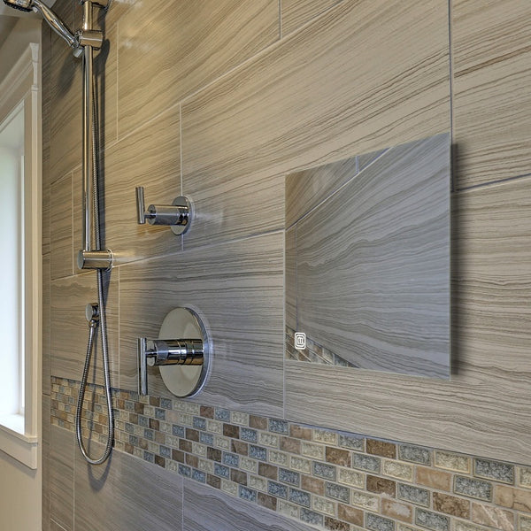 Clarity wall-mount, fog-free shower mirror for luxury bathrooms.