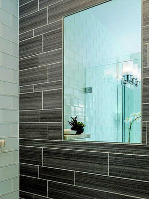 Flush-mount, fog-free shower mirror.